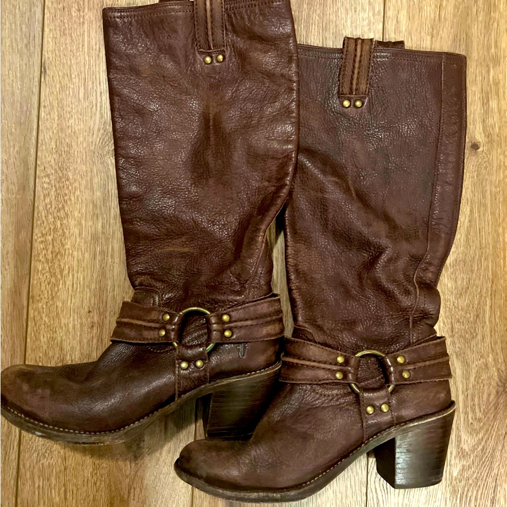 Tall brown leather Frye boots.